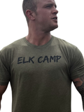 Man wearing a green t-shirt with 'ELK CAMP' text on a white background
